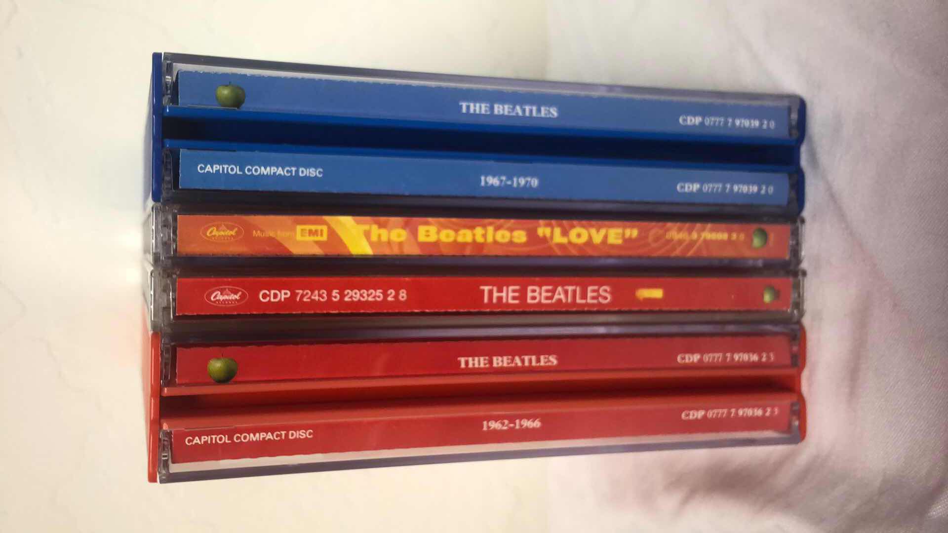 Photo 1 of ASSORTMENT OF THE BEATLES ALBUMS CDS (6)
