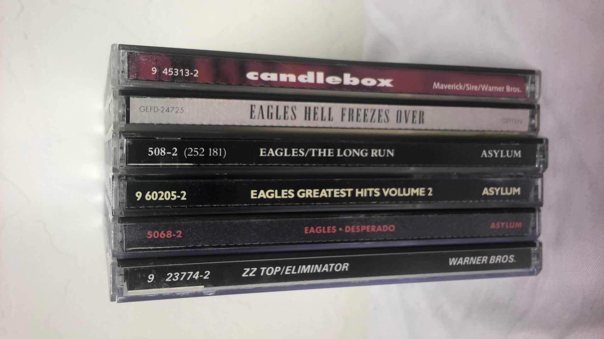 Photo 1 of ASSORTED ROCK ALBUM CDS EAGLES, ZZ TOP, CANDLEBOX (6)