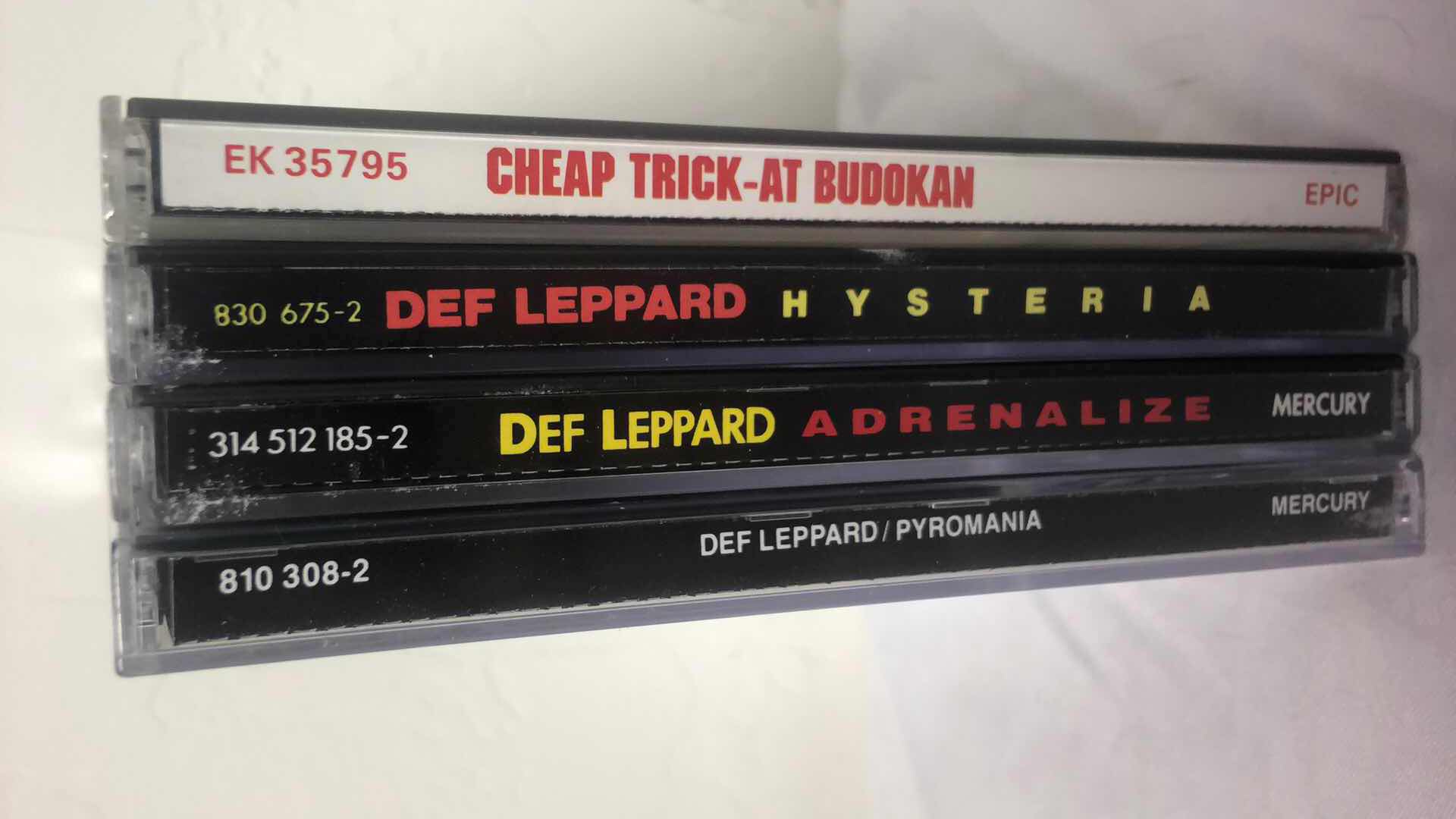 Photo 1 of ASSORTED DEF LEPPARD AND CHEAP TRICK ALBUM CDS (4)