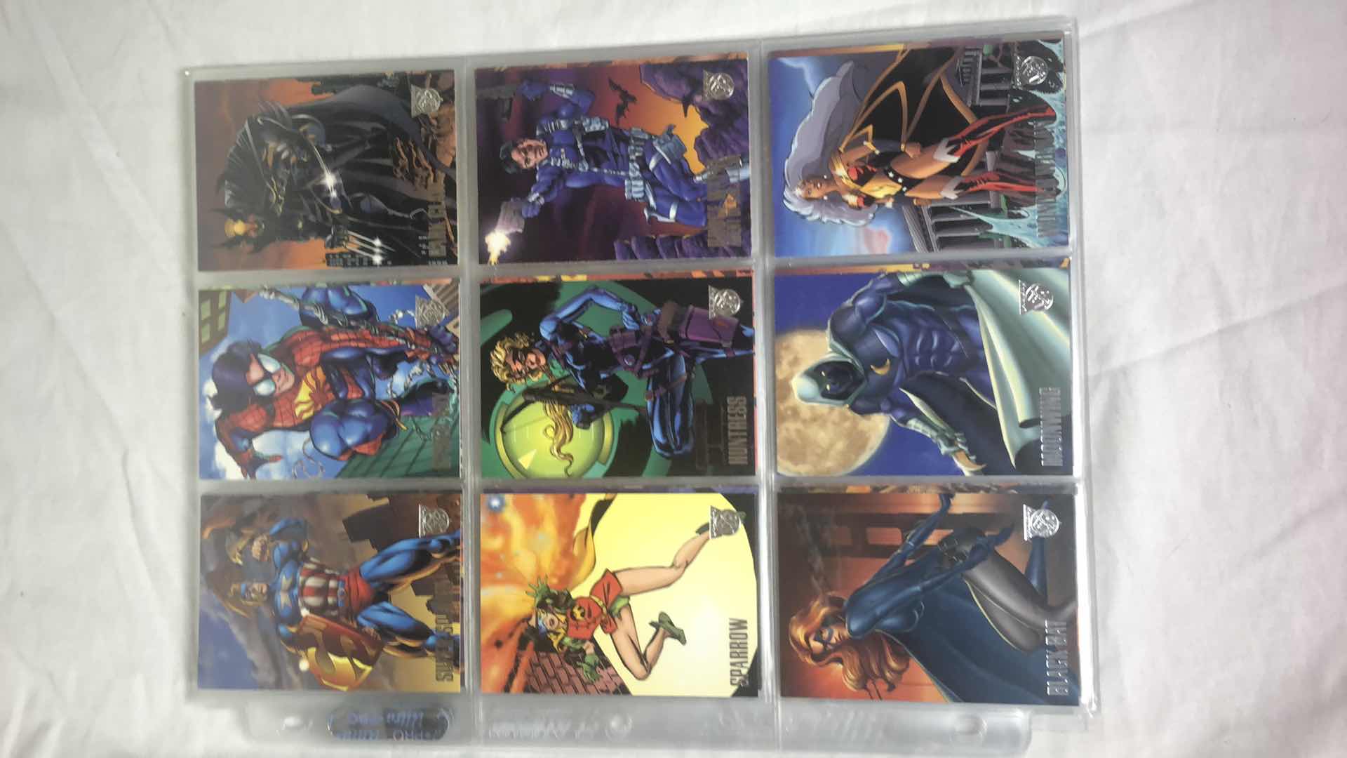 Photo 1 of APPROX 90 AMALGAM COMICS DC HEROES TRADING CARDS NEAR COMPLETE SET IN SLEEVES NEAR PERFECT CONDITION