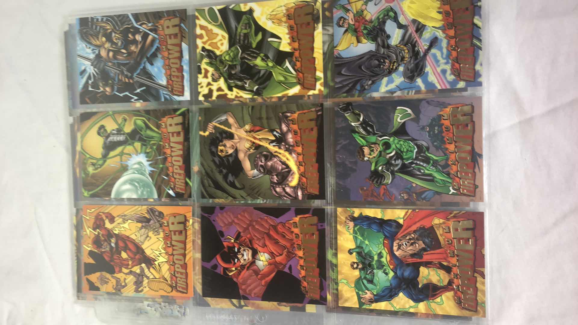 Photo 2 of APPROX 95 MAXIMUM FIREPOWER DC HEROES TRADING CARDS NEAR COMPLETE SET IN SLEEVES NEAR PERFECT CONDITION