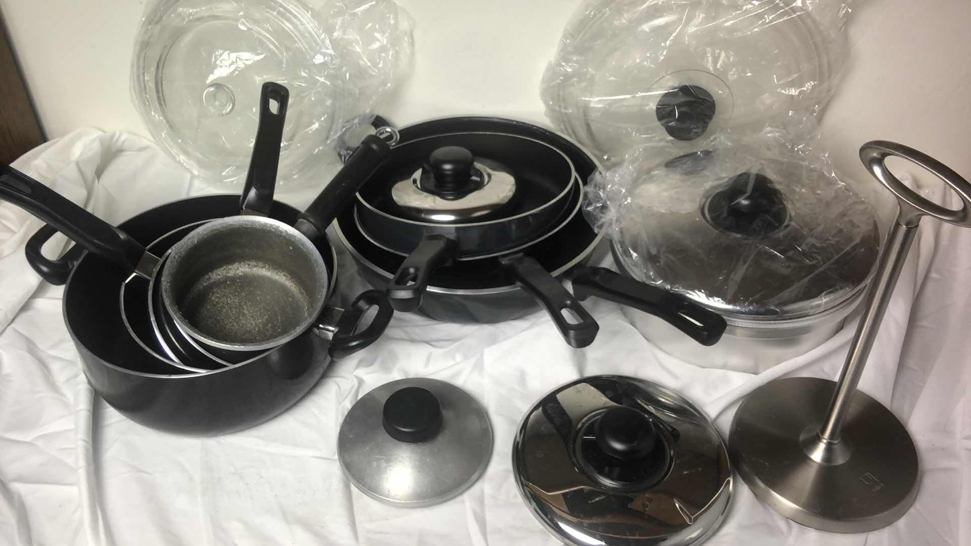 Photo 3 of BOX FULL OF WEAREVER POTS AND PANS W LIDS AND PAPER TOWEL HOLDER