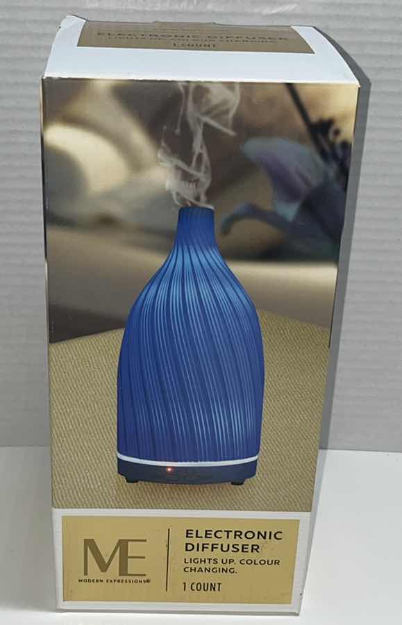 Photo 1 of NEW MODERN EXPRESSIONS LIGHT UP COLOR CHANGING ELECTRONIC DIFFUSER (1)
