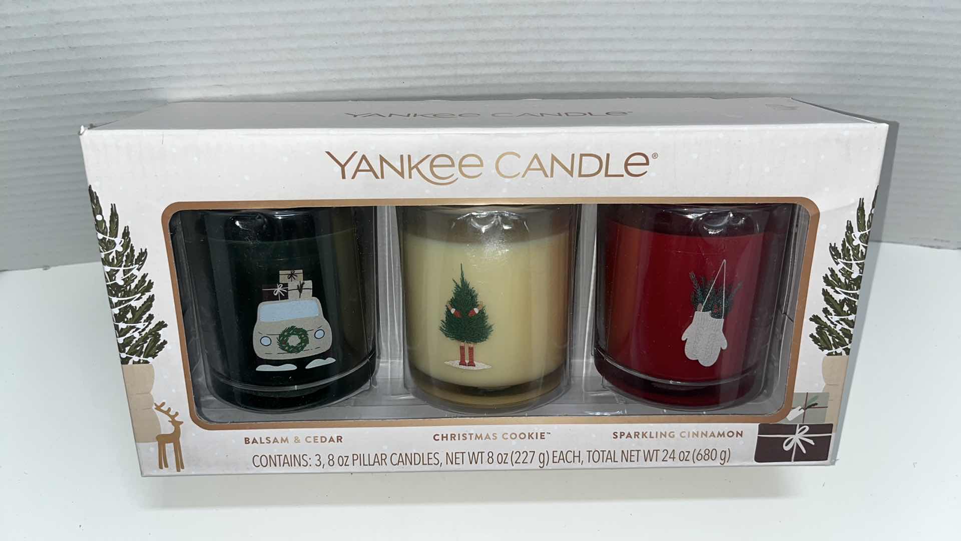 Photo 1 of NEW YANKEE CANDLE HOLIDAY CANDLE GIFT SET, THREE 8 OZ PILLAR SCENTED CANDLES 