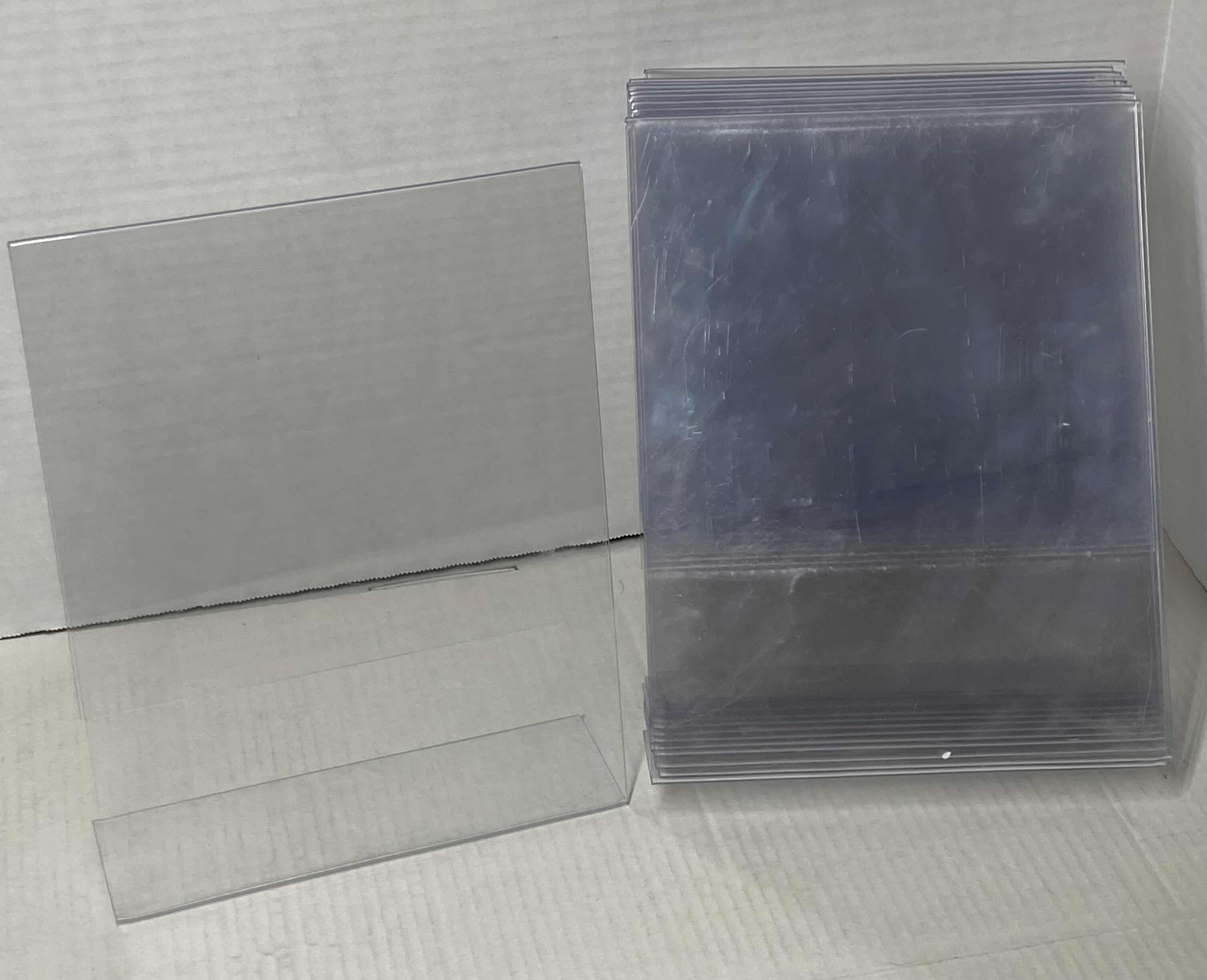 Photo 2 of CLEAR SLANTED PLASTIC SIGN HOLDERS 12PACK 8.5” X 11”