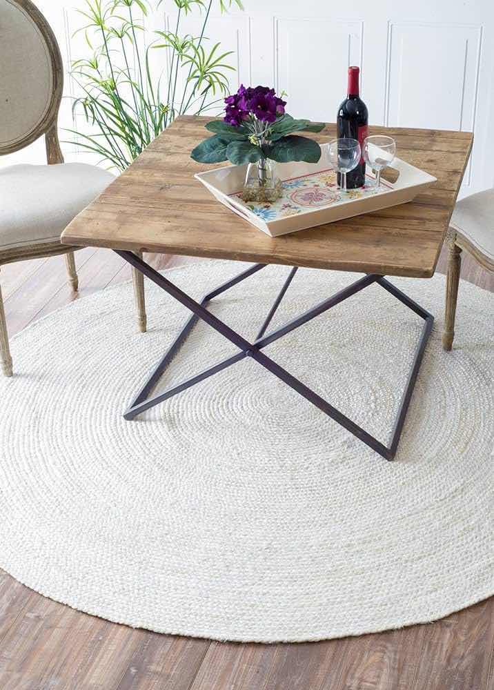 Photo 1 of THE KNITTED CO JUTE BRAIDED HAND WOVEN NATURAL FIBERS DYED OFF-WHITE AREA RUG 8’ DIA