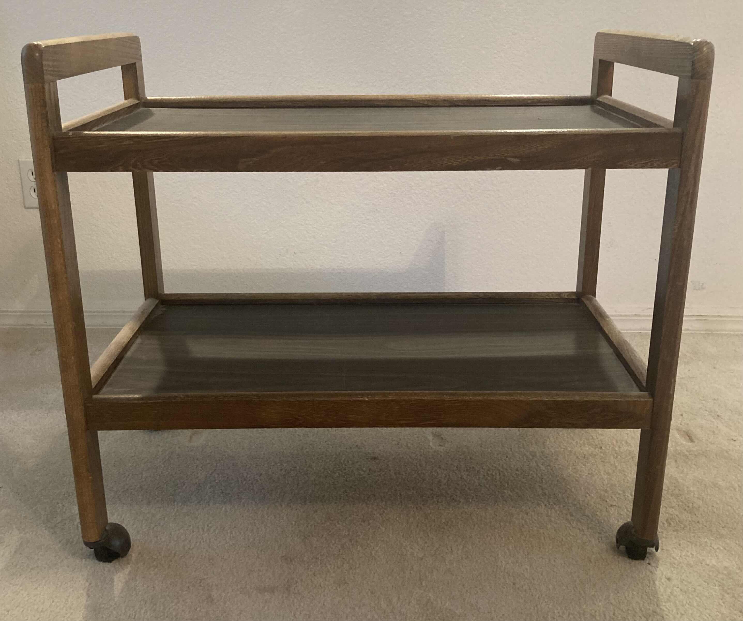 Photo 1 of MID CENTURY WOOD FINISH ROLLING BAR CART 30” X 17” H27”