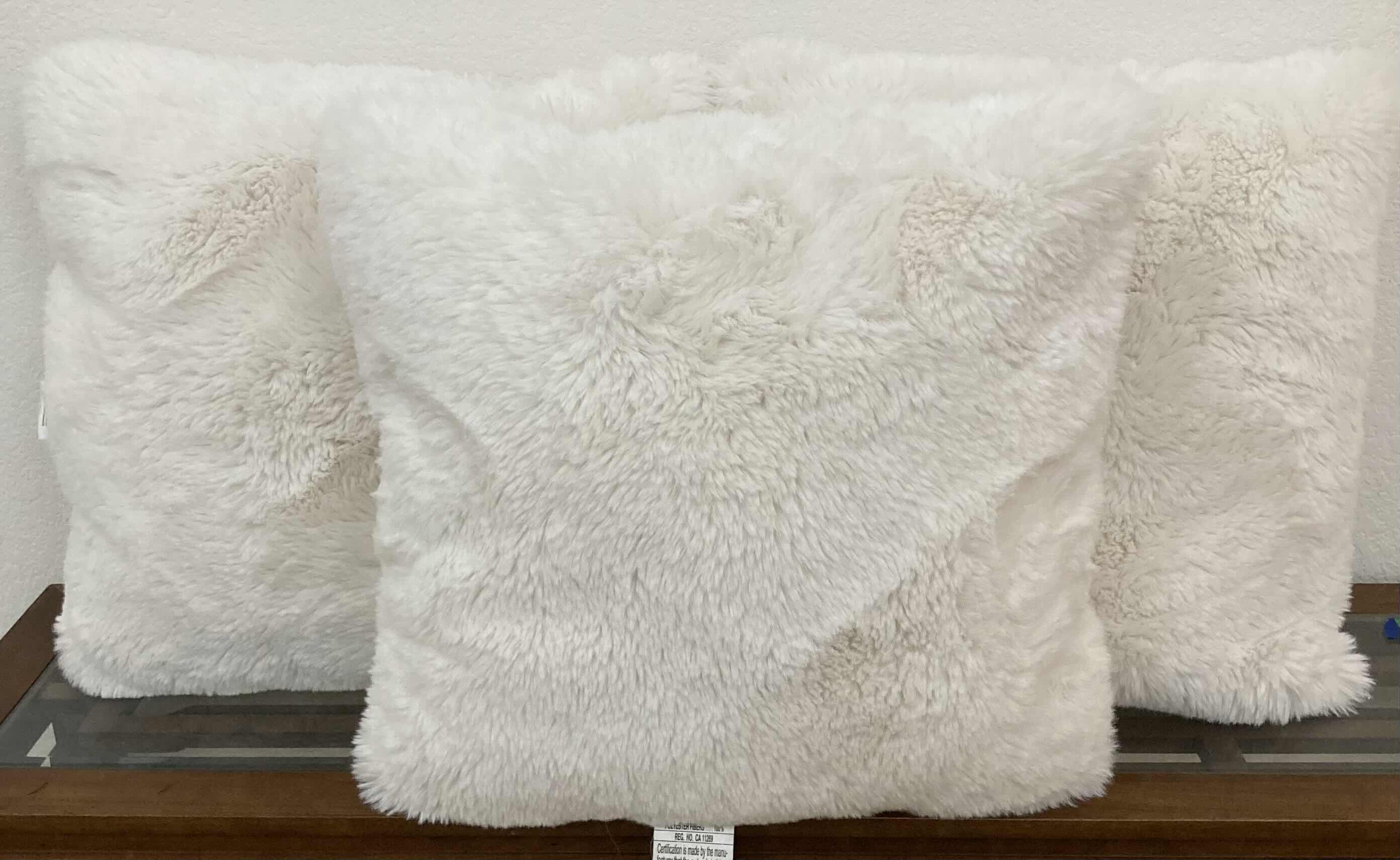 Photo 2 of OEKE TEX CREAM FAUX FUR PILLOWS (3) 20” X 20”