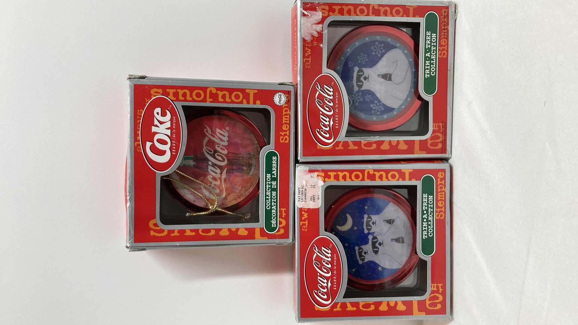 Photo 1 of COCA-COLA TRIM A TREE COLLECTION HOLOGRAPHIC ORNAMENTS (3)