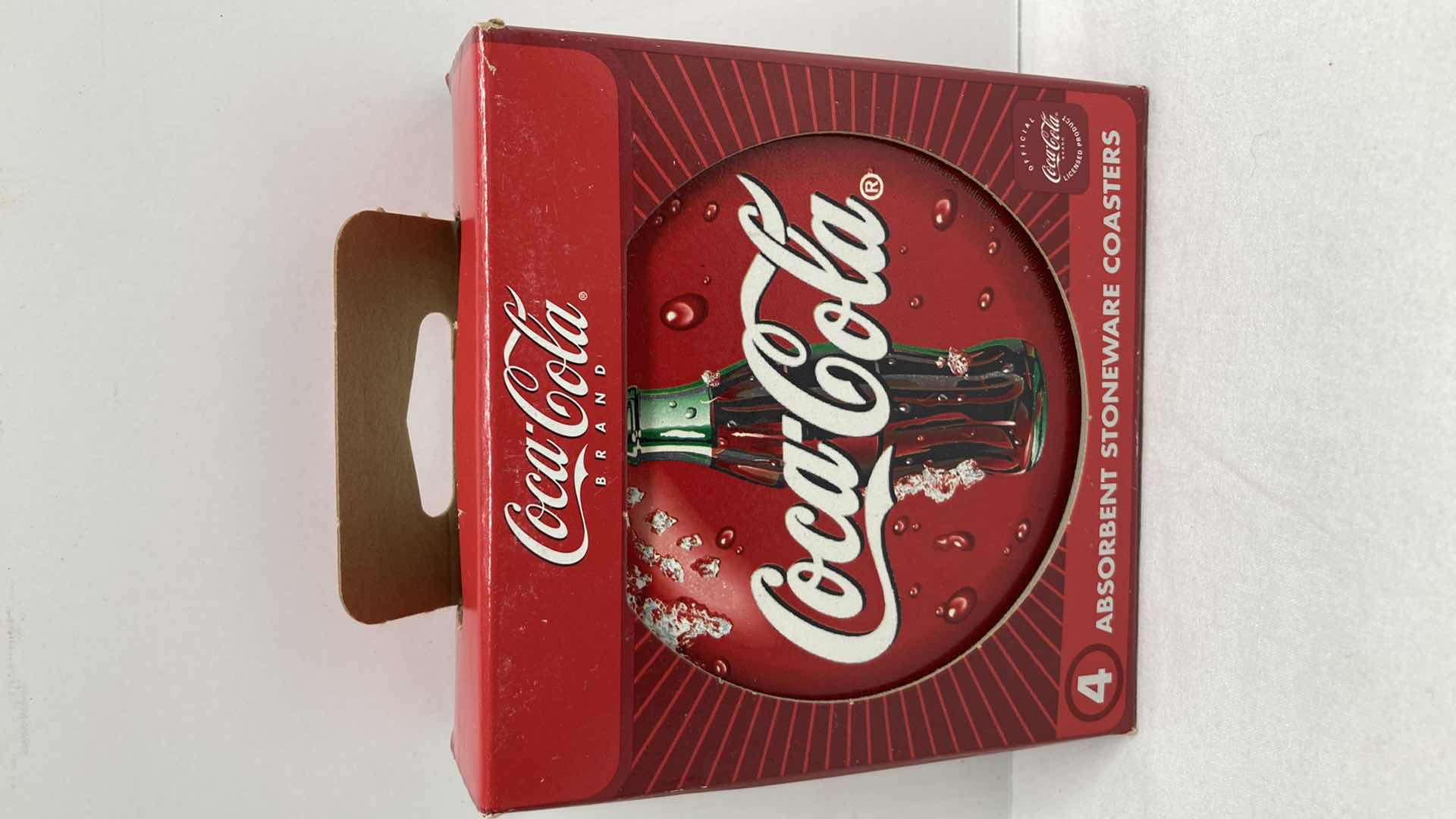 Photo 1 of COCA-COLA ABSORBENT STONEWARE W NATURAL CORK BACK COASTERS (4)