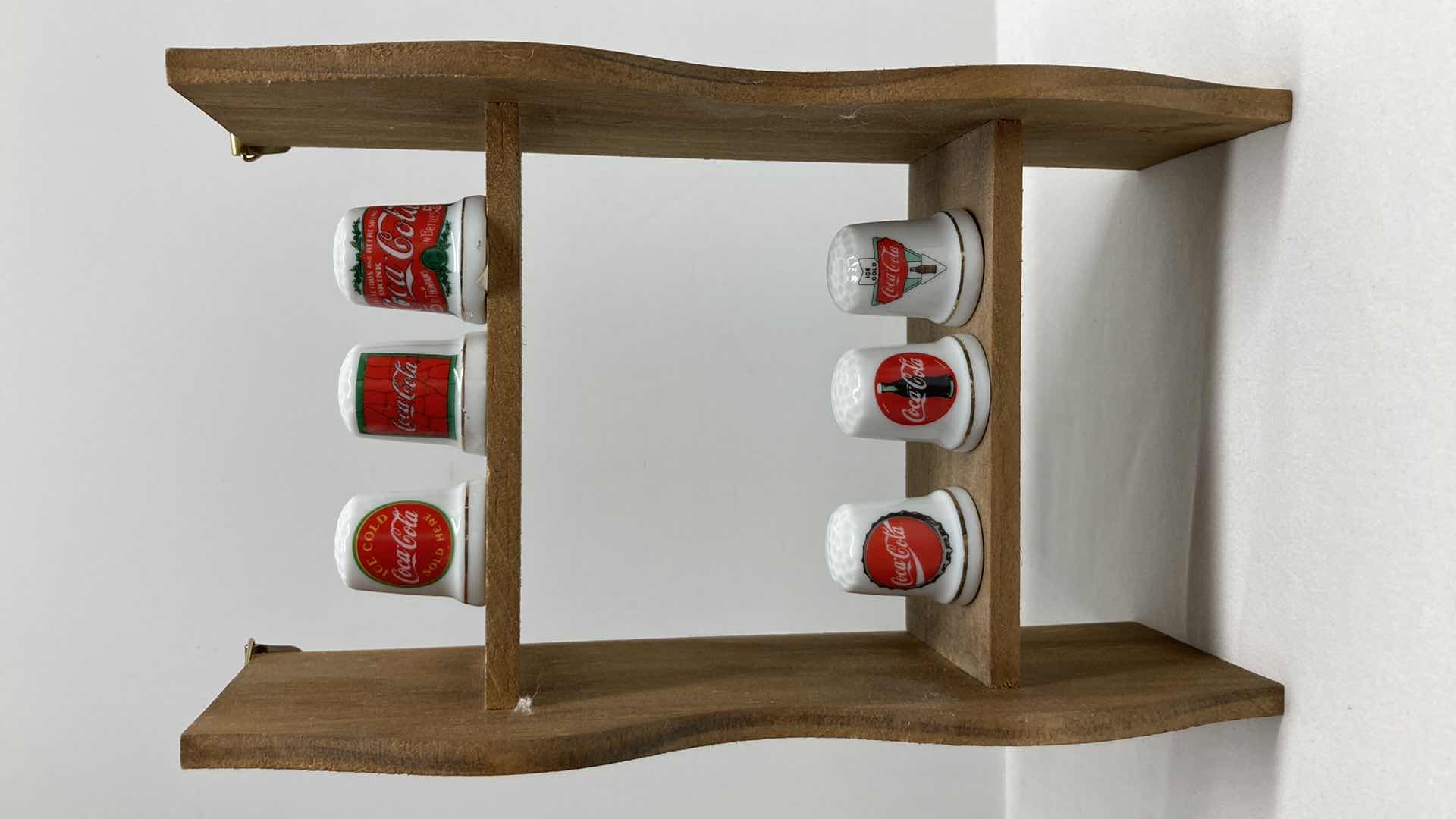 Photo 1 of COCA-COLA THIMBLES W WOOD RACK 4.5” X 3” H8”