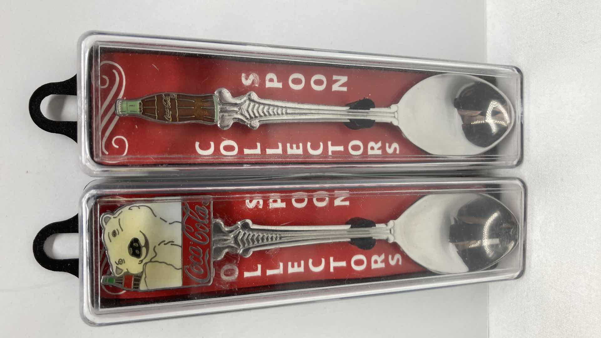 Photo 2 of COCA-COLA COLLECTORS SPOONS & CORN HOLDERS