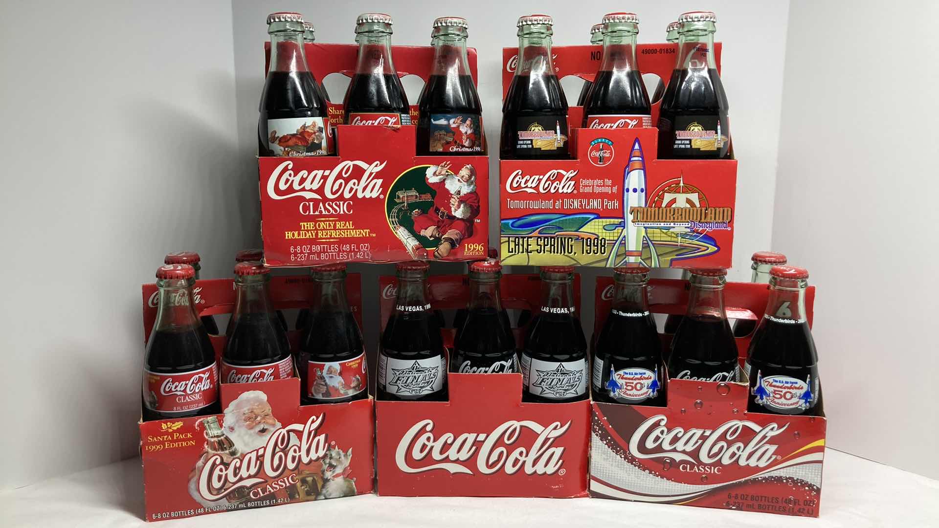 Photo 1 of COCA-COLA SPECIAL EDITION 6 PACK SEALED GLASS BOTTLES & CASES (5)