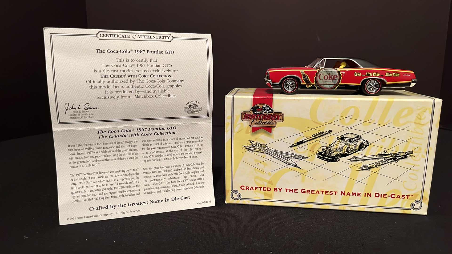 Photo 1 of COCA-COLA MATCHBOX COLLECTIBLES DINKY 1967 PONTIAC GTO, W COA, 1995 (MODEL YMC03/B-M)