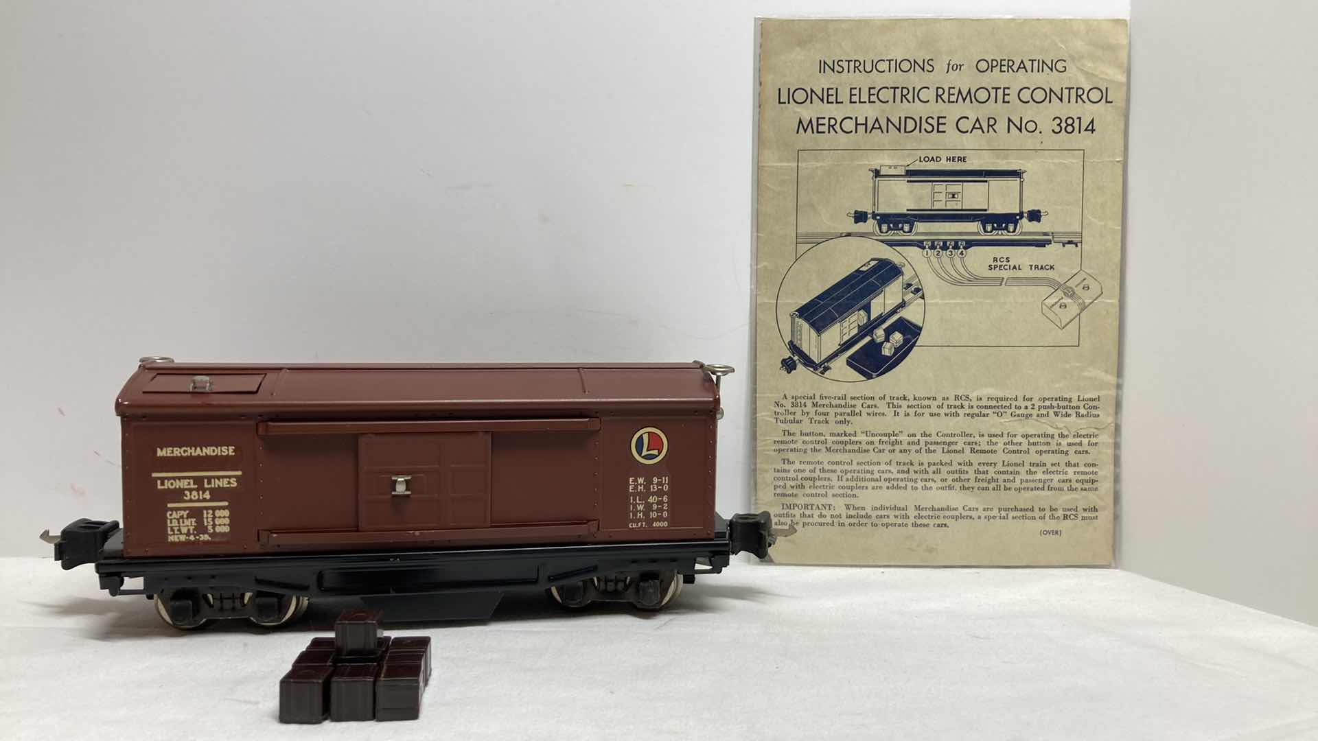 Photo 1 of LIONEL PREWAR MERCHANDISE CAR 3814 W CRATES & INSTRUCTIONS