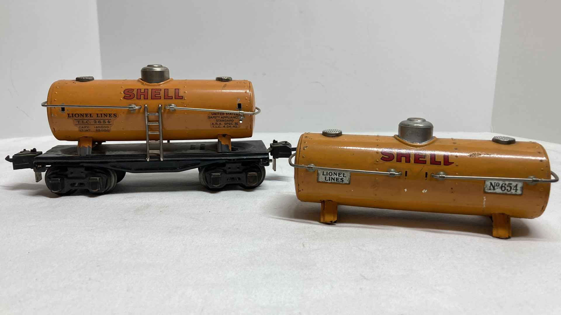 Photo 1 of LIONEL PREWAR SHELL TANK CAR 2654 & LIONEL PREWAR SHELL TANK 654