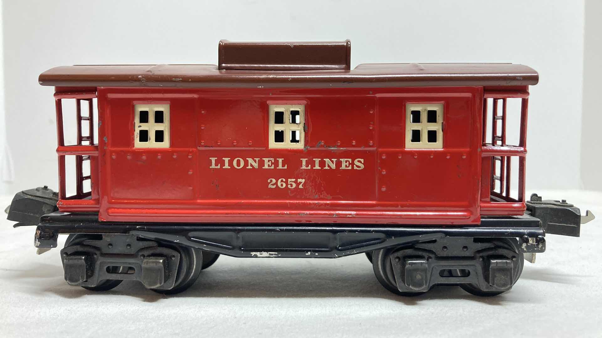 Photo 1 of LIONEL PREWAR CABOOSE CAR 2657