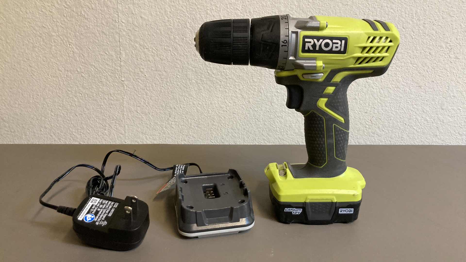 Photo 1 of RYOBI DRILL W CHARGER MODEL HJP003