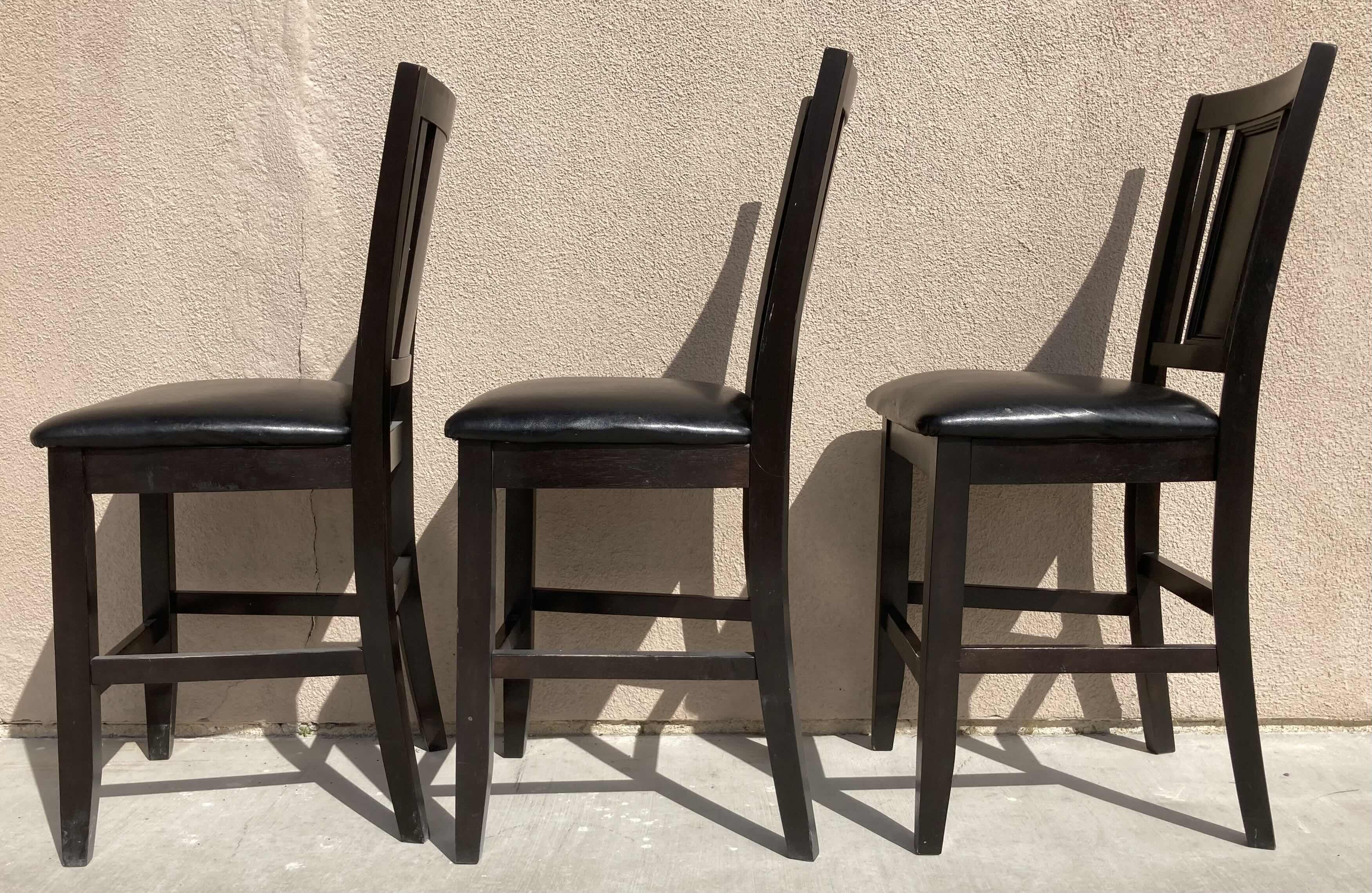 Photo 5 of ASHLEY FURNITURE CARLYLE COLLECTION BLACK WOOD FINISH BAR STOOLS SET OF 3 19” X 17” H40”