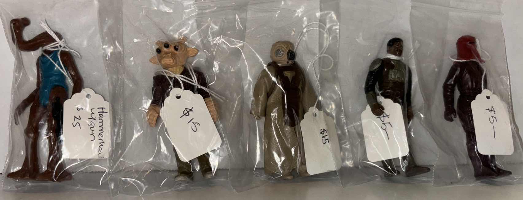 Photo 1 of VINTAGE STAR WARS MYSTERY GRAB BAGS (VALUE $65-$71), PICTURES ARE EXAMPLES OF STAR WARS FIGURES, FIGURES WILL VARY **NO RETURNS**