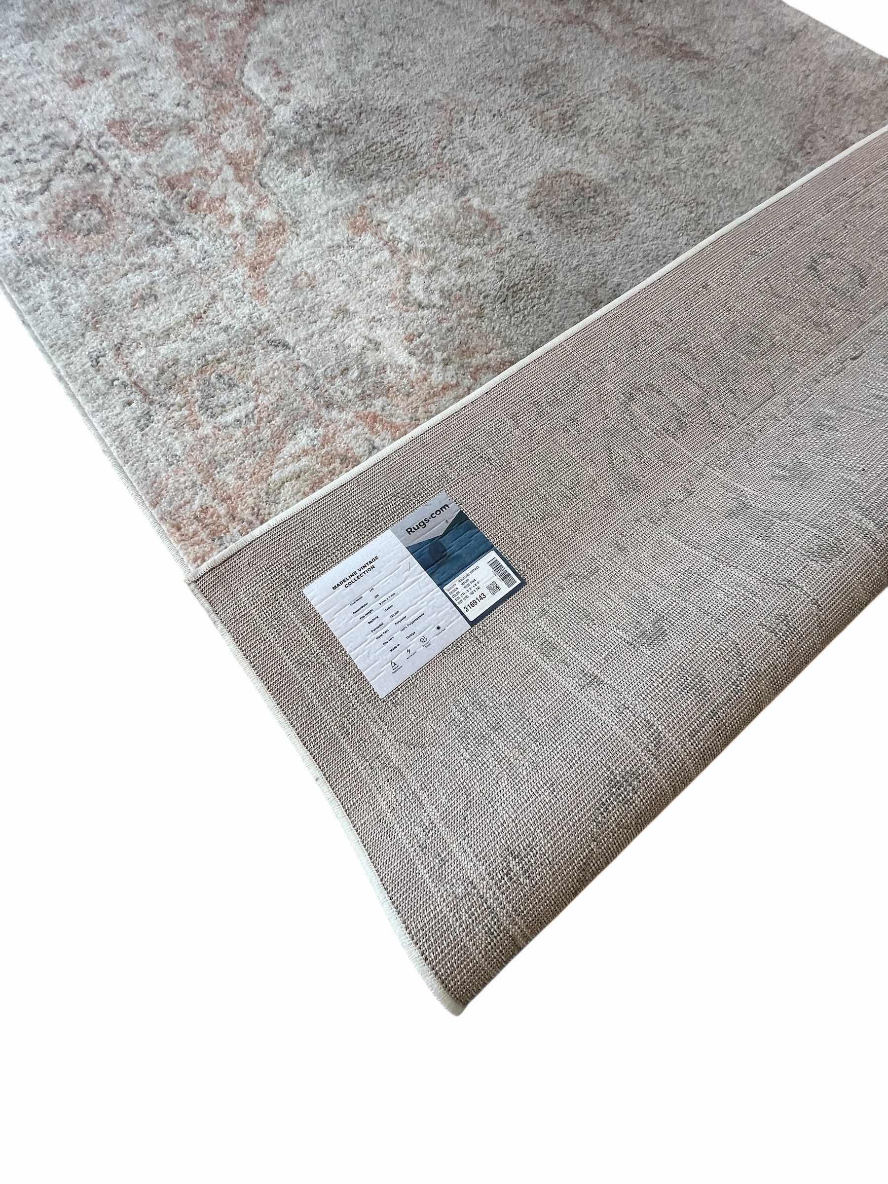 Photo 1 of RUGS.COM MADELINE VINTAGE COLLECTION ROSE PINK AREA RUG 5'3" X 8'