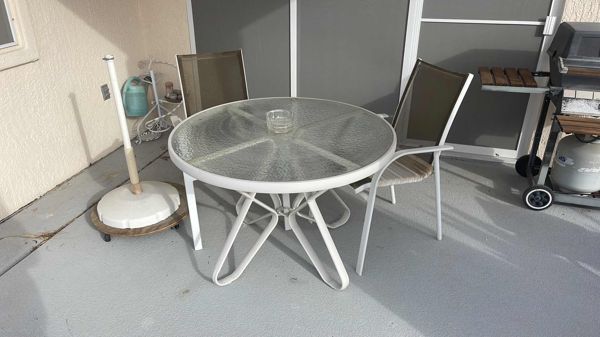 Photo 1 of 4 PC OUTDOOR PATIO 42” ROUND TABLE SET W TWO CHAIRS & UMBRELLA(STAND IS DAMAGED)