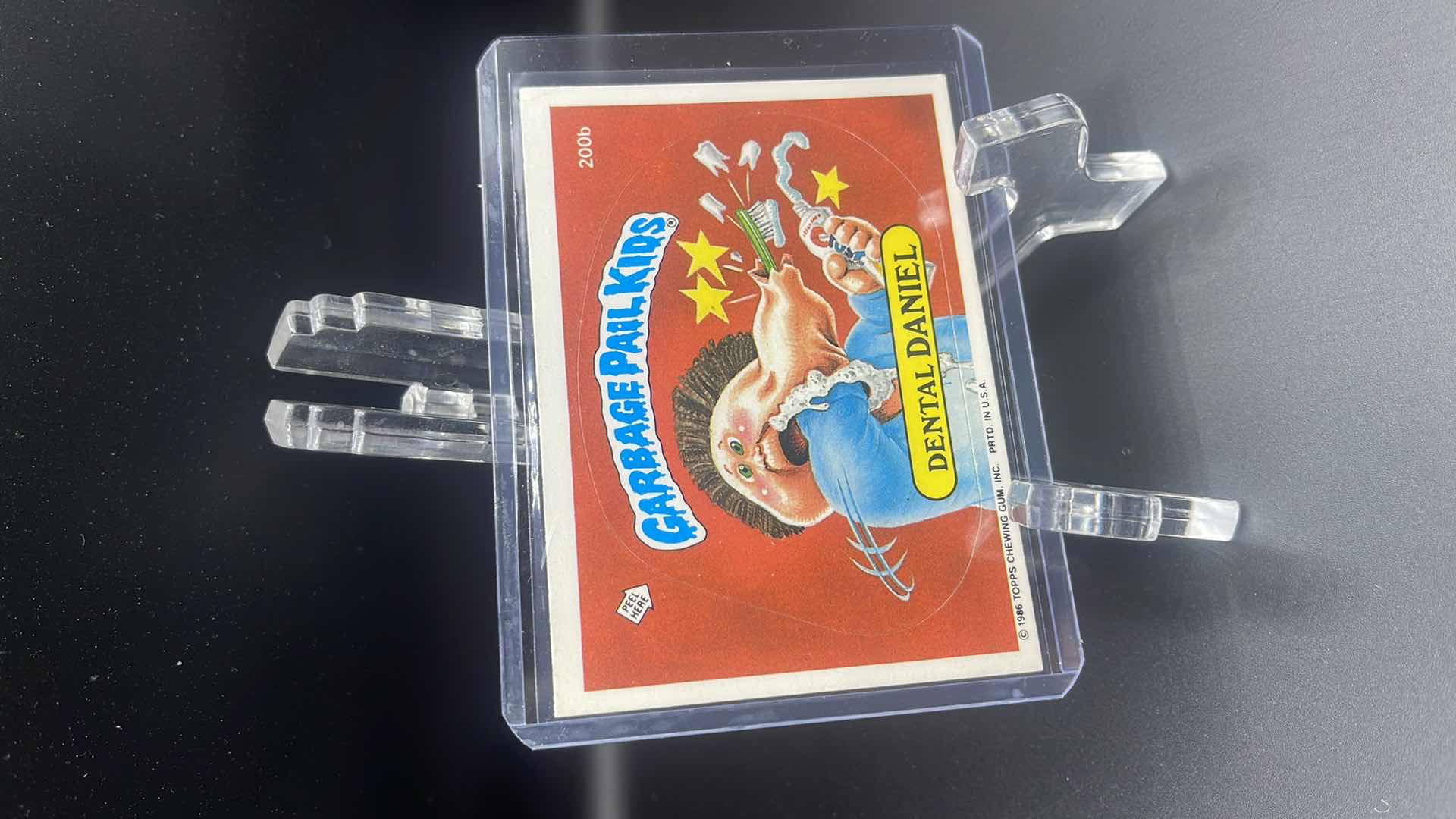 Photo 1 of 1986 GARBAGE PAIL KIDS “DENTAL DANIEL” CARD