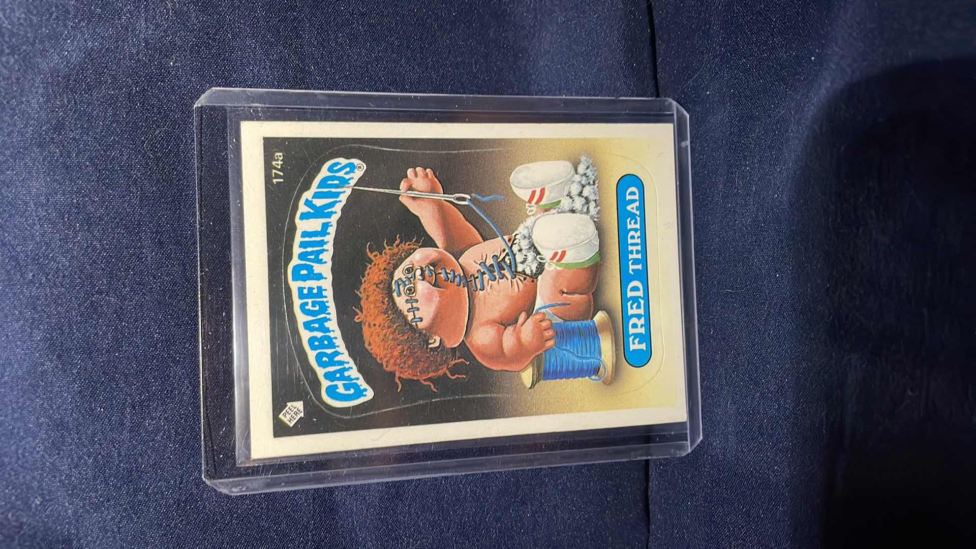 Photo 1 of 1986 TOPPS GARBAGE PAIL KIDS FRED THREAD CARD #174a