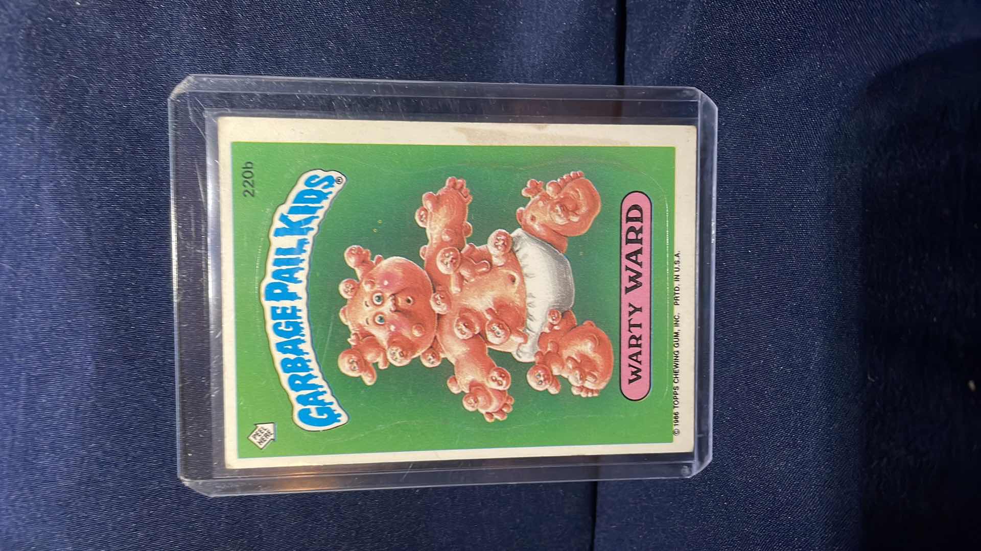 Photo 1 of 1986 TOPPS GARBAGE PAIL KIDS WARTY WARD CARD #220b