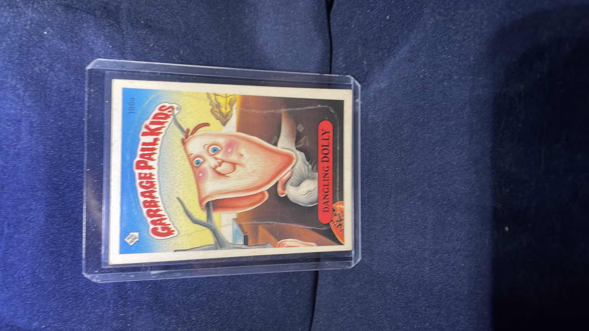 Photo 1 of 1986 GARBAGE PAIL KIDS DANGLING DOLLY CARD