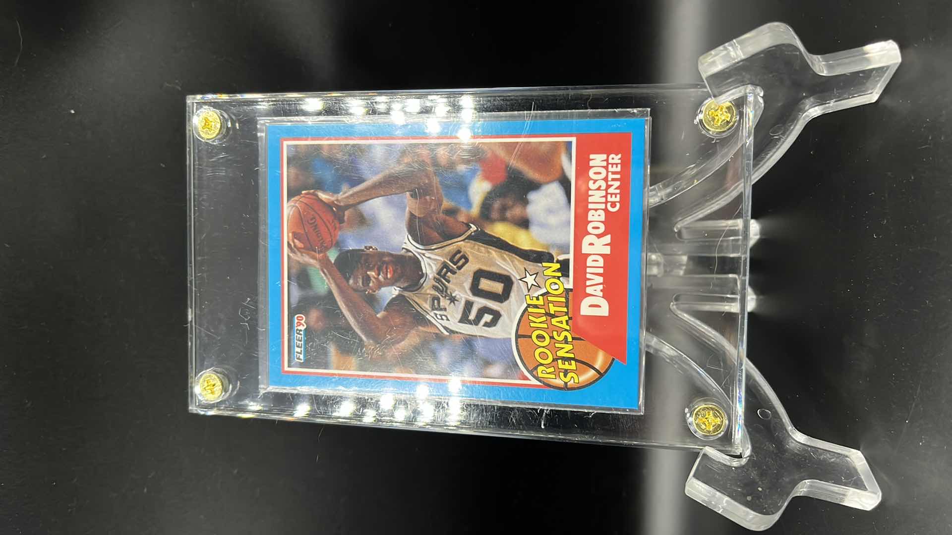 Photo 1 of 1990 DAVID ROBINSON FLEER ROOKIE SENSATION CARD 1