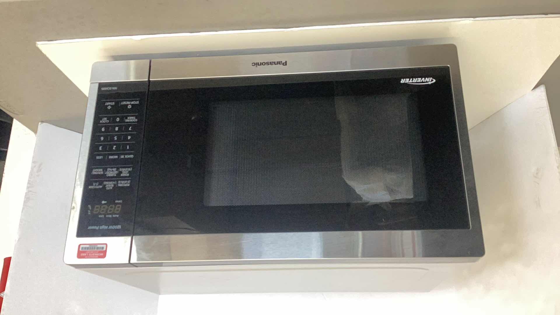 Photo 1 of PANASONIC MICROWAVE INVERTER 20” X 15” H 12”