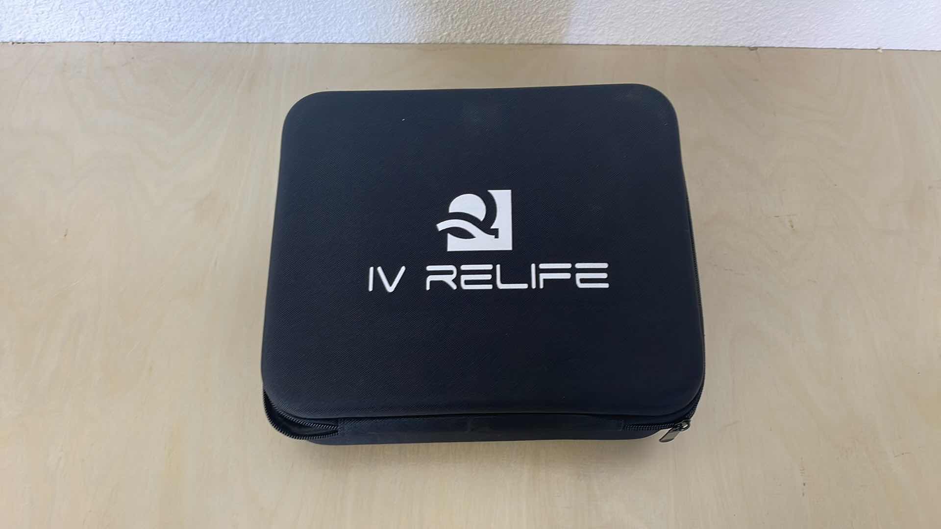 Photo 2 of IV RELIFE PERCUSSION MASSAGER WITH ATTACHMENTS