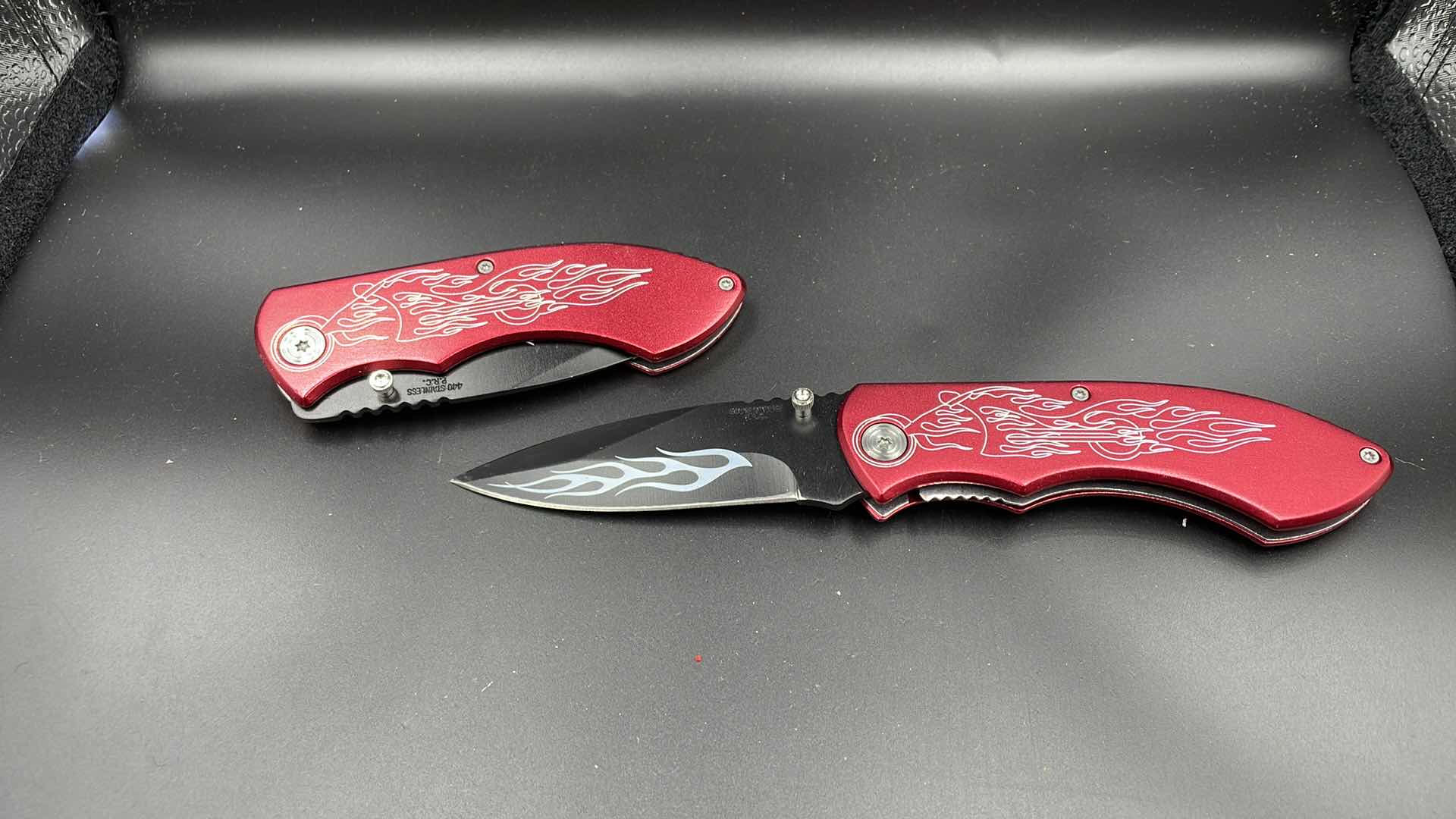 Photo 1 of SET OF TWO RED CHOPPER FOLDING KNIVES 8”