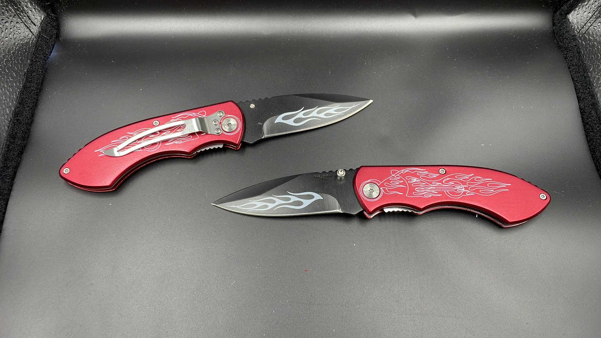 Photo 2 of SET OF TWO RED CHOPPER FOLDING KNIVES 8”