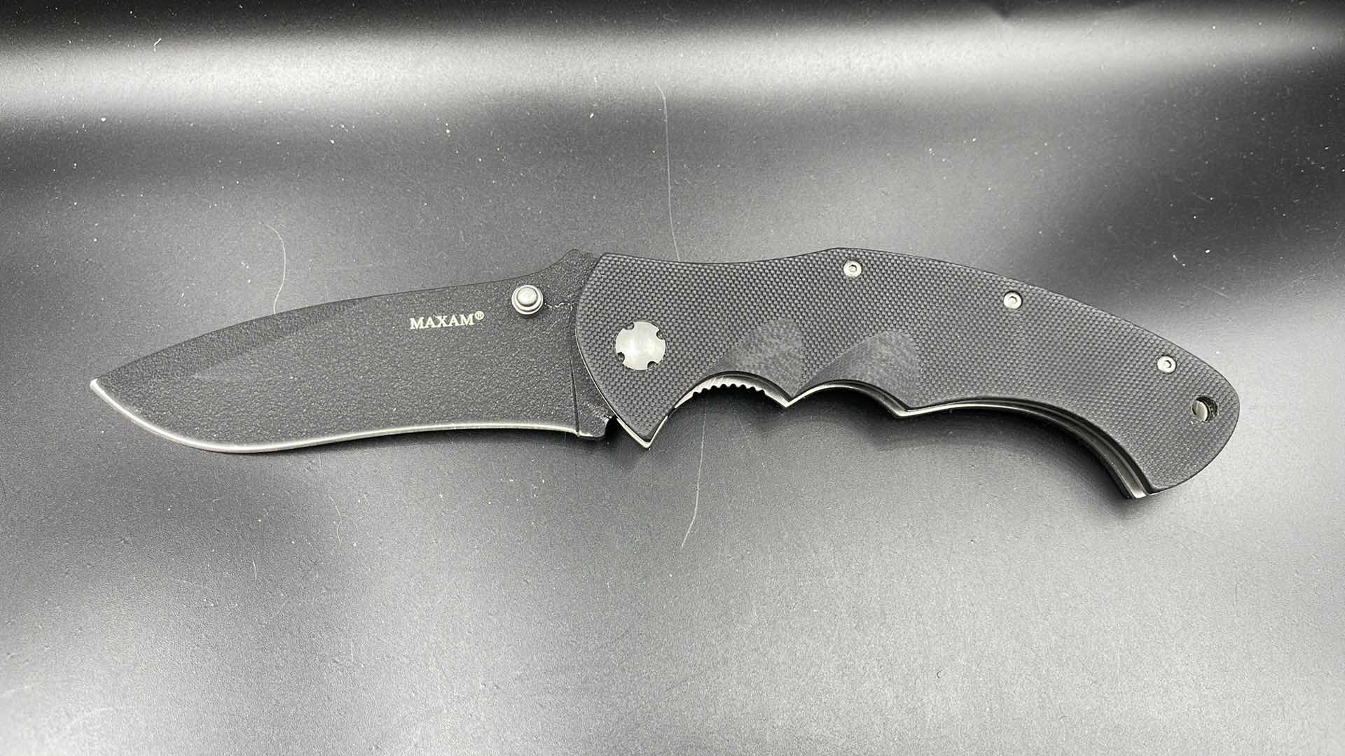 Photo 1 of MAXAM FOLDING BLACK HUNTING KNIFE 9”