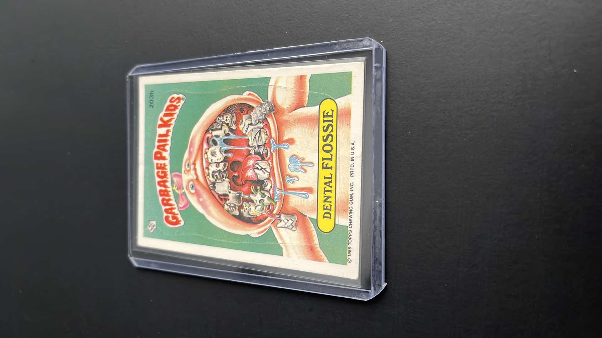 Photo 2 of 1988 GARBAGE PAIL KIDS DENTAL FLOSSIE TOPPS CARD 203B