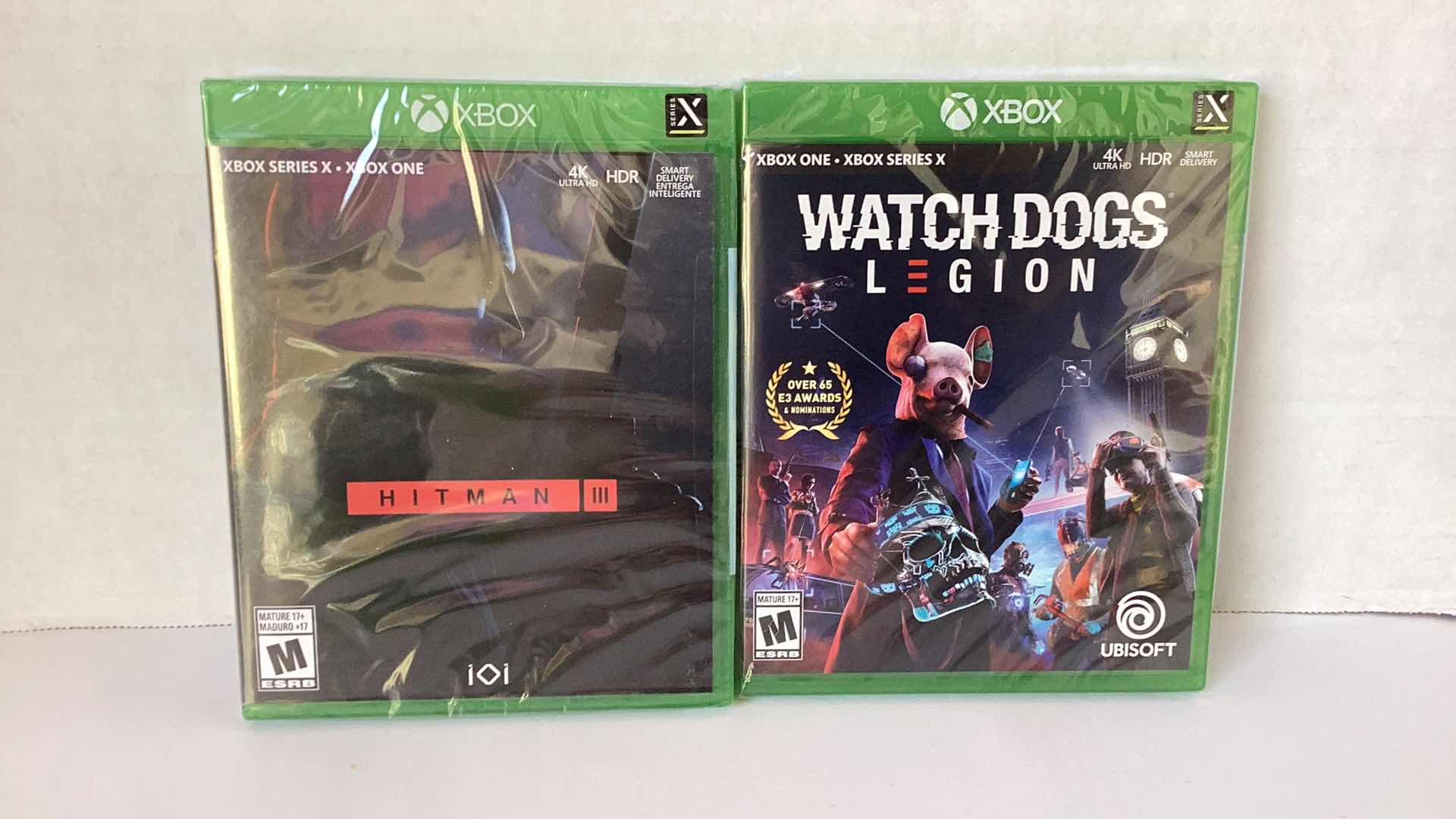 Photo 1 of 2 NEW X-BOX GAMES: HITMAN III AND WATCH DOGS LEGION