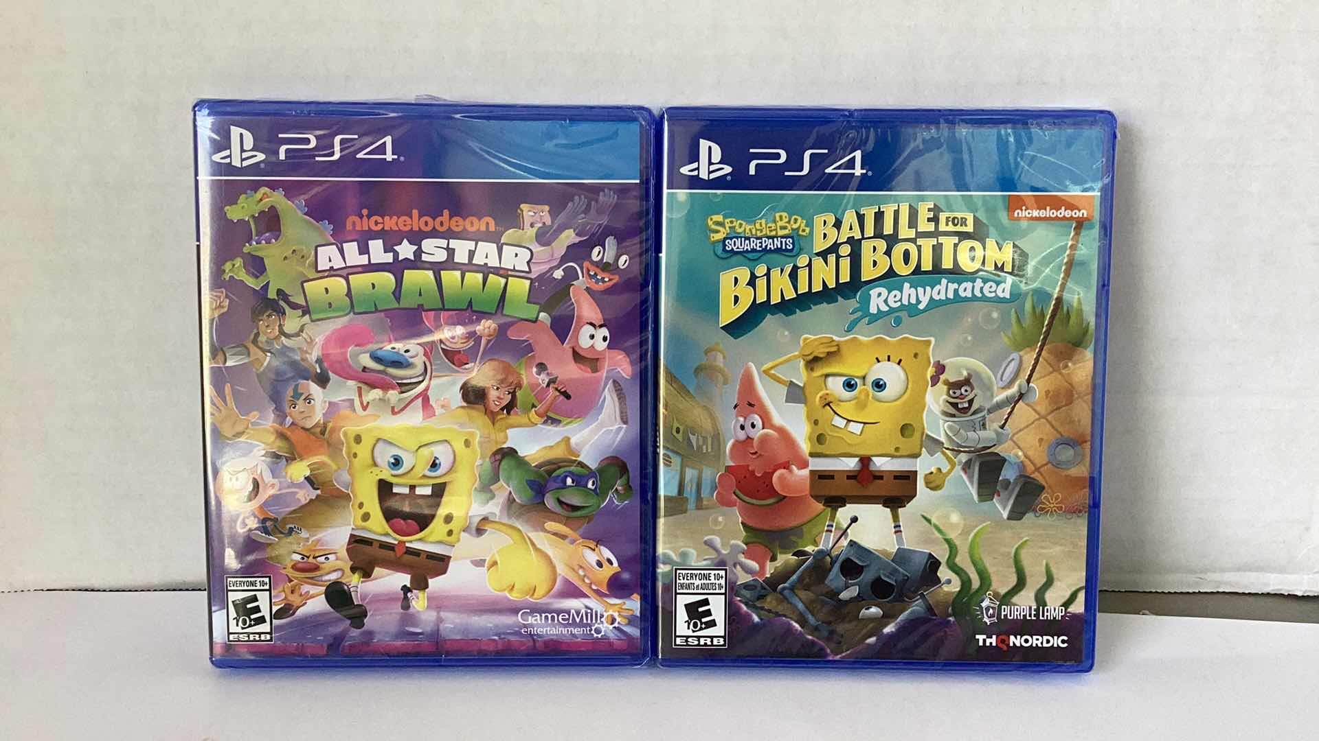 Photo 1 of 2 NEW PS4 GAMES: NICKELODEON ALL STAR BRAWL AND SPONGEBOB SQUAREPANTS BATTLE FOR BIKINI BOTTOM REHYDRATED