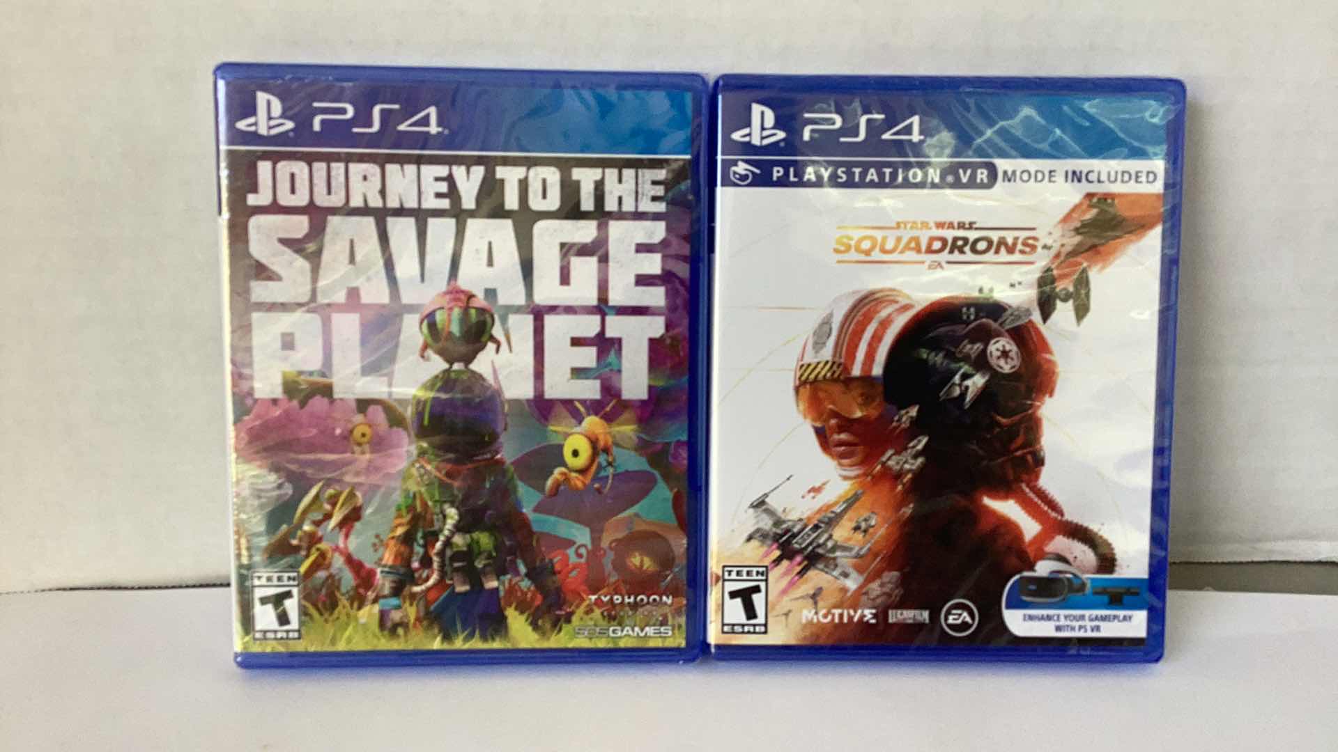 Photo 1 of 2 NEW PS4 GAMES: JOURNEY TO THE SAVAGE PLANET AND STAR WARS SQUADRONS