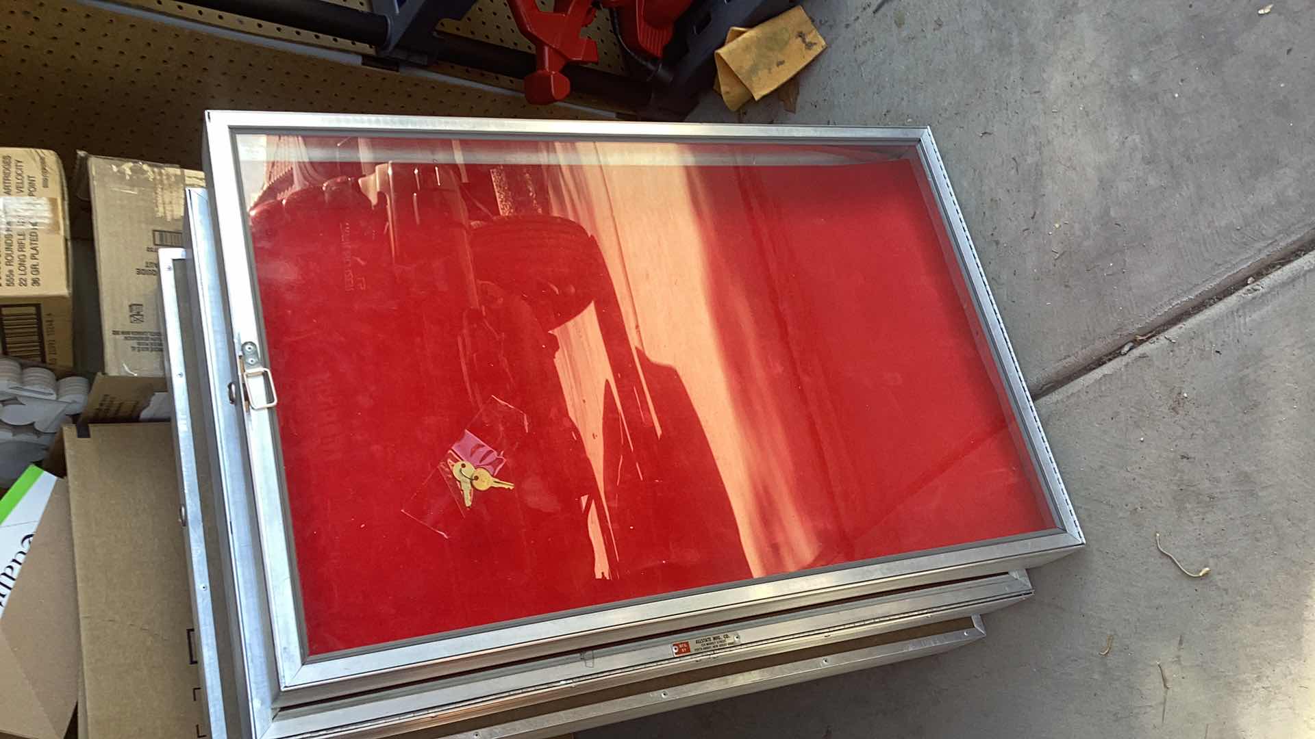 Photo 1 of ONE GLASS AND ALUMINUM DISPLAY CASE WITH KEYS
