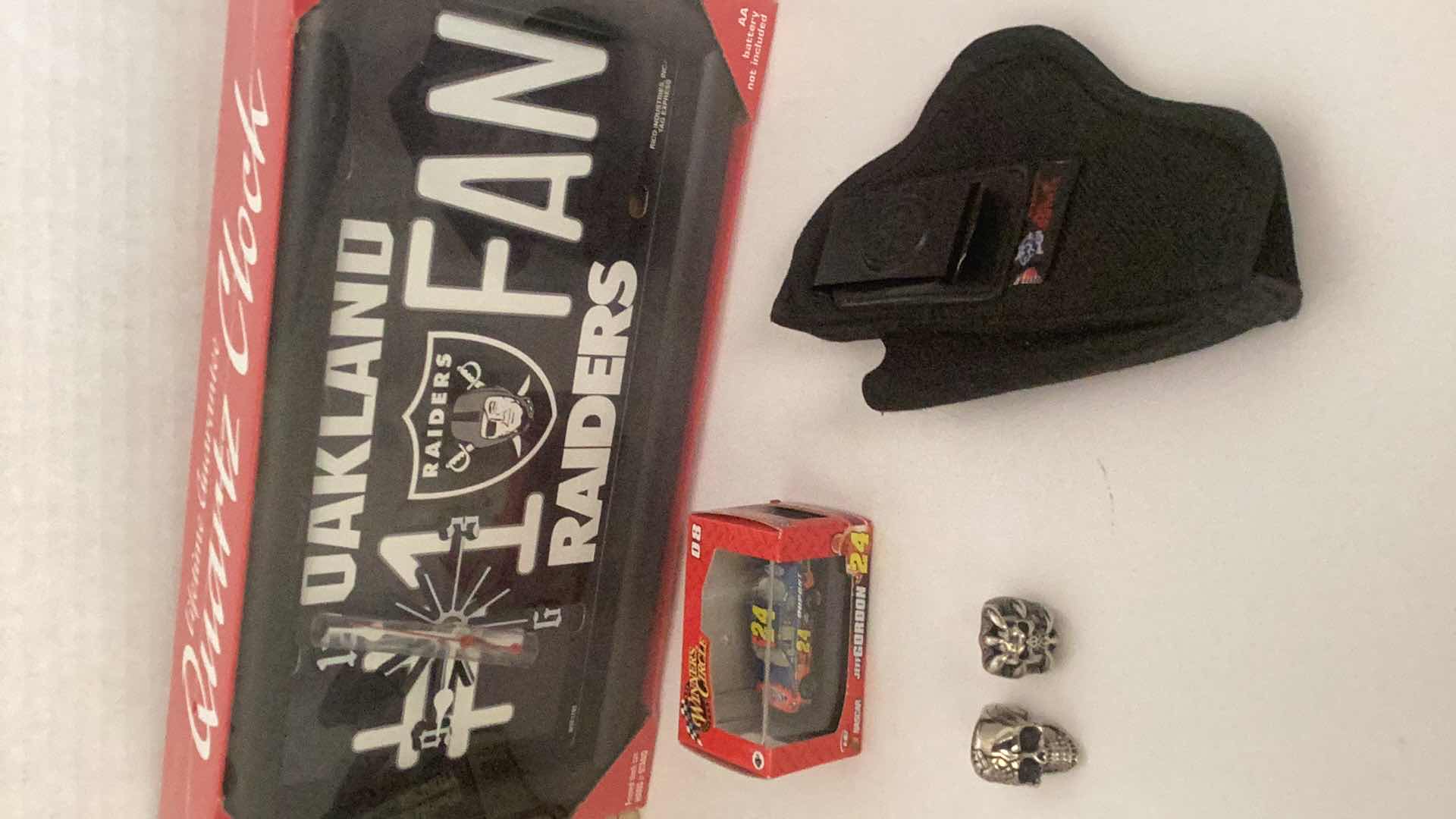 Photo 4 of ASSORTED COLLECTIBLE'S-COMIC BOOK, KNIFE, RINGS, NASCAR & OAKLAND RAIDER'S CLOCK