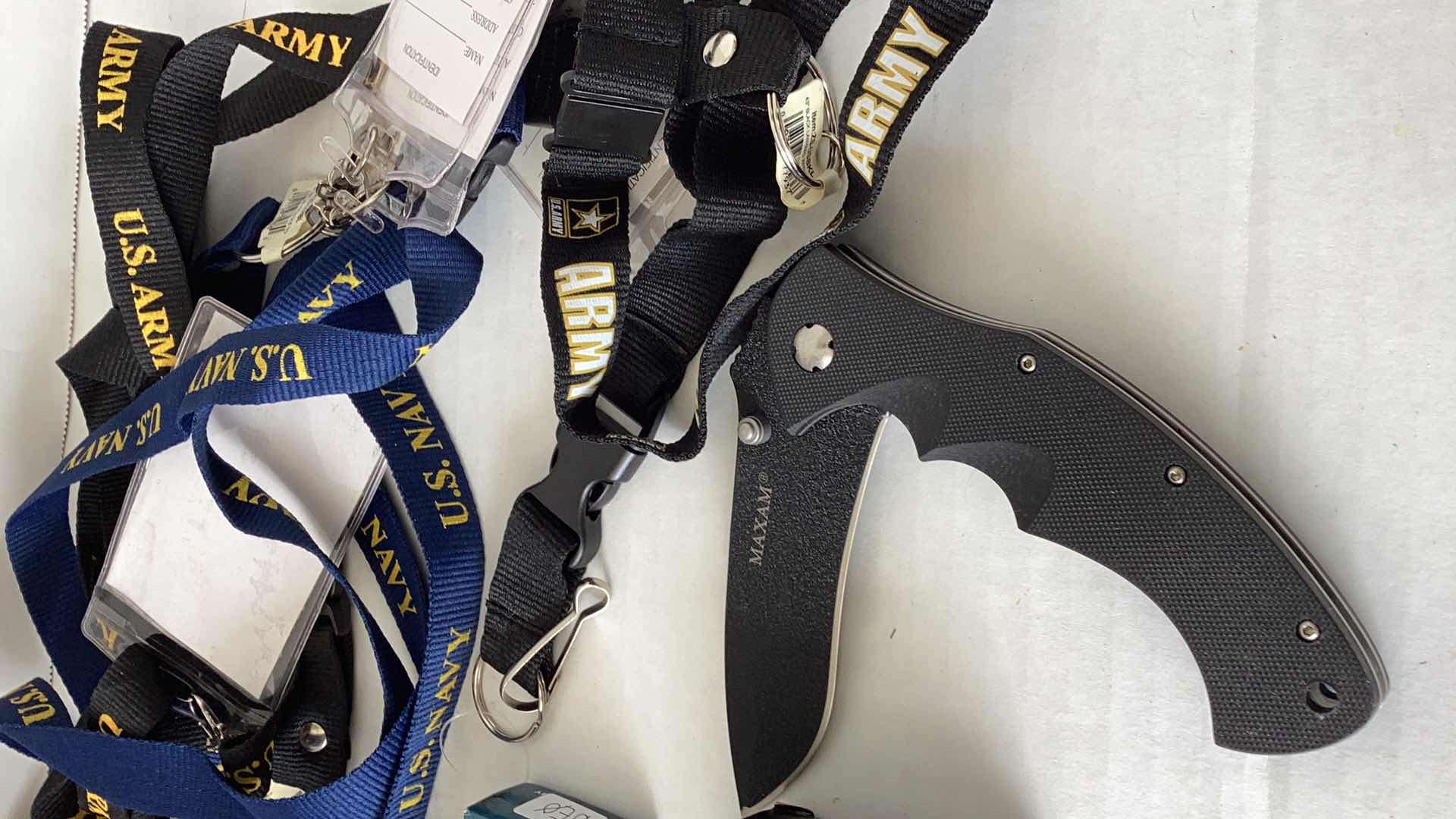 Photo 2 of ARMED FORCES ARMY NAVY LANYARDS AND KNIVES