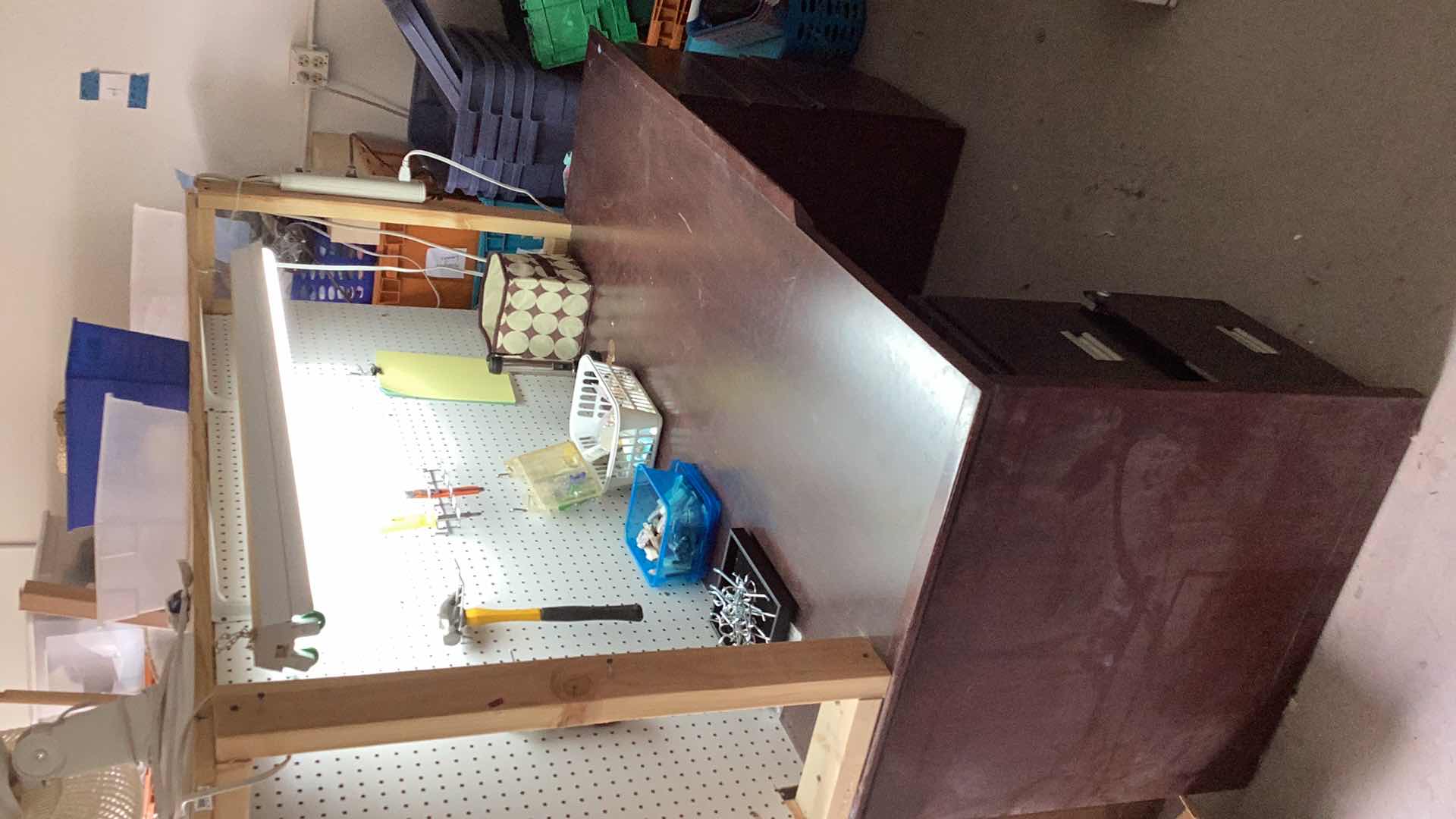 Photo 1 of CRAFT BENCH WITH LIGHT AND FILE CABINET. PEG BOARD INCLUDED.