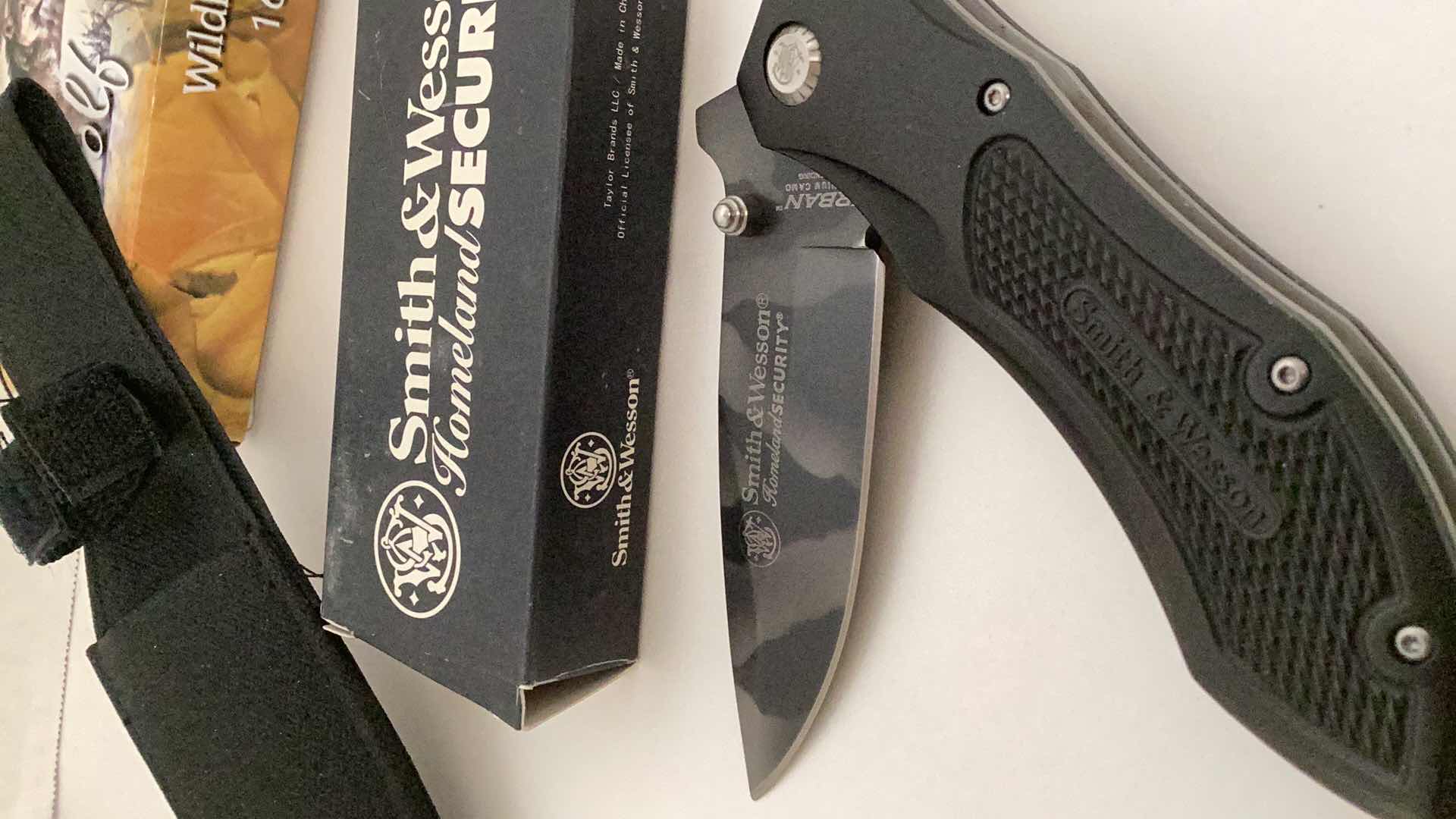 Photo 4 of SMITH AND WESSON HOMELAND SECURITY KNIVES, SHARPENING STONE, AND RINGS