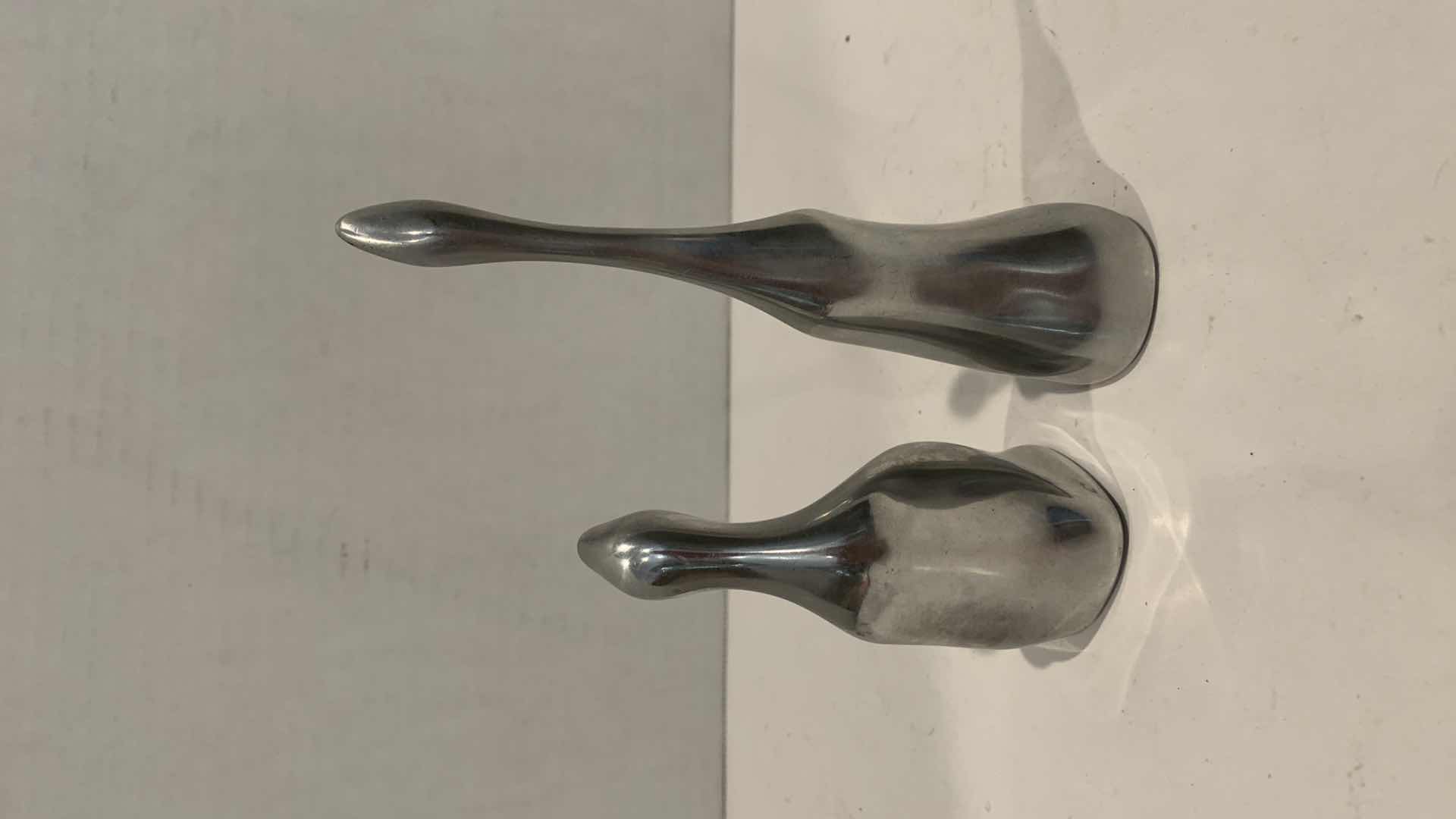 Photo 2 of PAIR OF ALUMINUM SWANS NUMBERED, TALLEST IS 6”