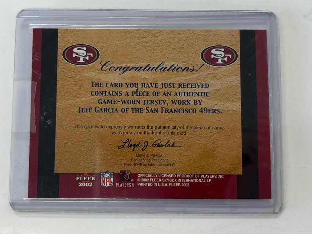 Photo 1 of 2002 TERRELL OWENS AND JEFF GARCIA FLEER CLASSIC COMBINATIONS GAME JERSEY CARD