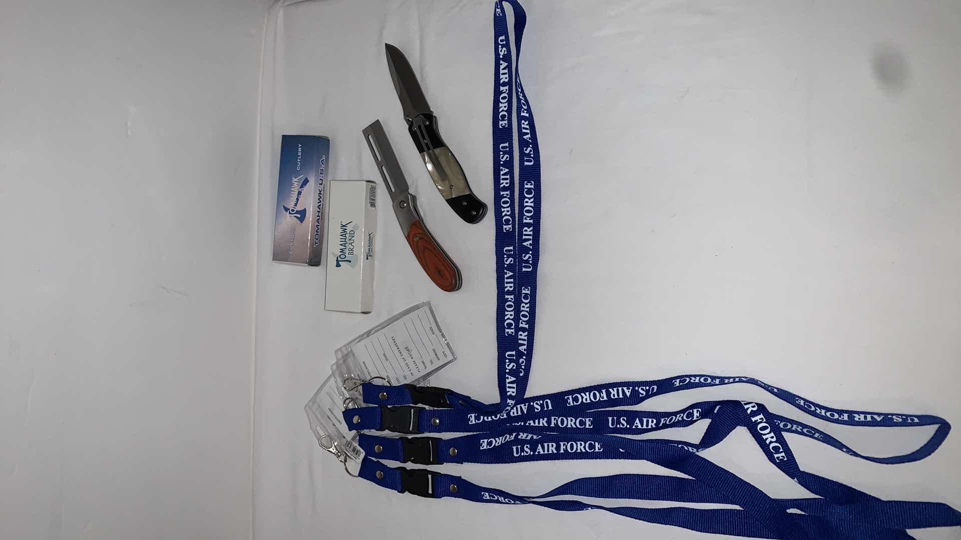 Photo 1 of SET OF U.S. AIR FORCE LANYARDS AND 2 TOMAHAWK BRAND KNIVES