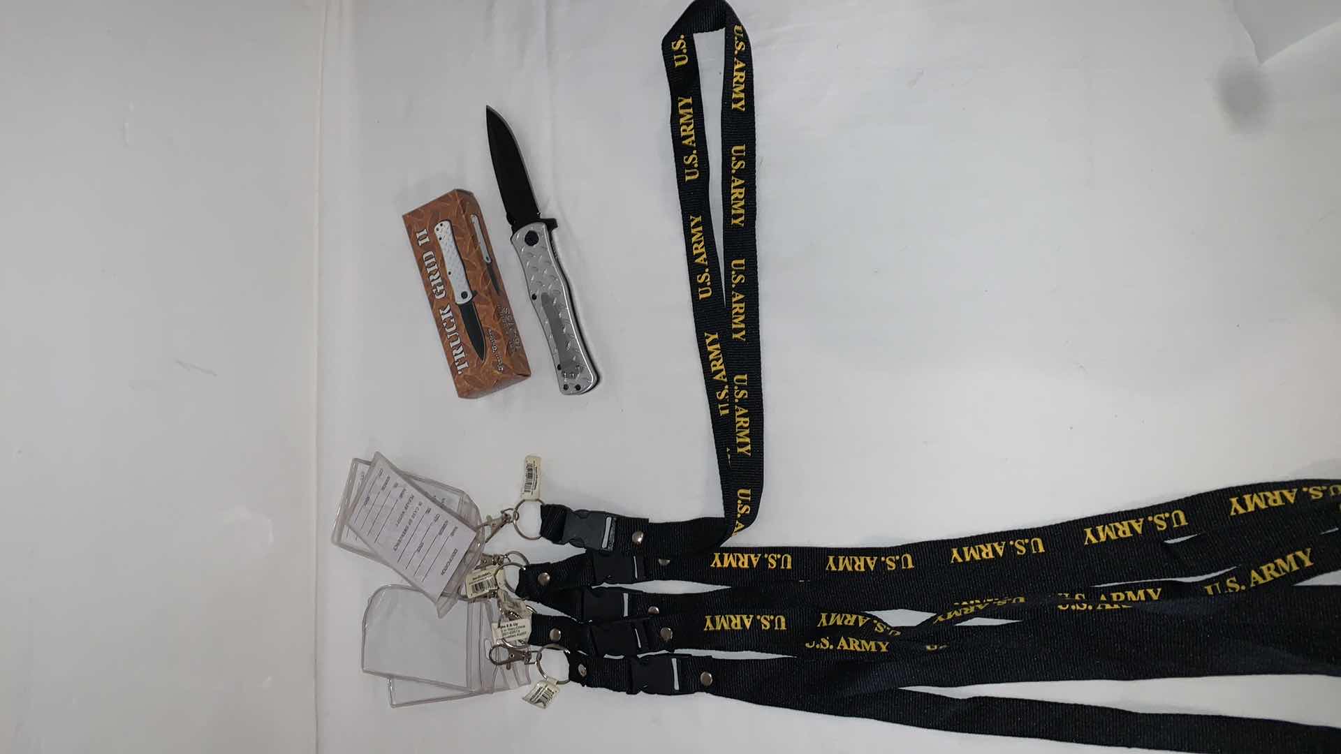 Photo 1 of SET OF U.S. ARMY LANYARDS AND TRUCK GRID II KNIFE