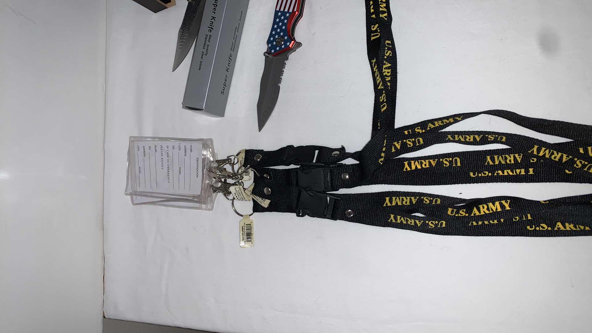 Photo 2 of SET OF U.S. ARMY LANYARDS WITH SUPER KNIFE, SPIDER-MAN KNIFE, AND CAT EYE MELEE PROTECTION
